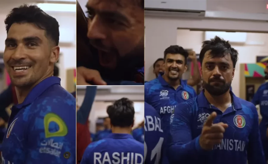 Afghanistan players joyfully celebrate their victory against Australia in the dressing room